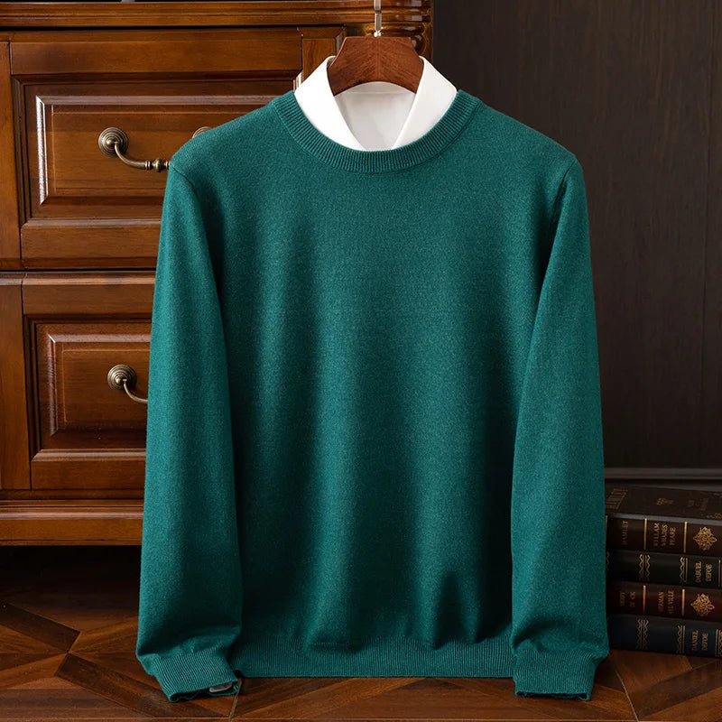 Suéter de cuello redondo de lana merino para hombre: prenda de punto suave, cálida y versátil para otoño e invierno.