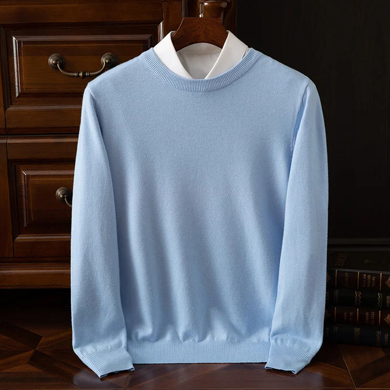 Suéter de cuello redondo de lana merino para hombre: prenda de punto suave, cálida y versátil para otoño e invierno.