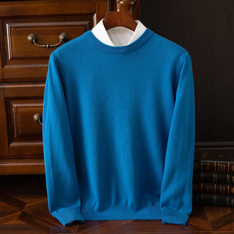 Suéter de cuello redondo de lana merino para hombre: prenda de punto suave, cálida y versátil para otoño e invierno.